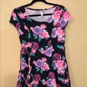 Justice floral print dress with tie back.  Size 18